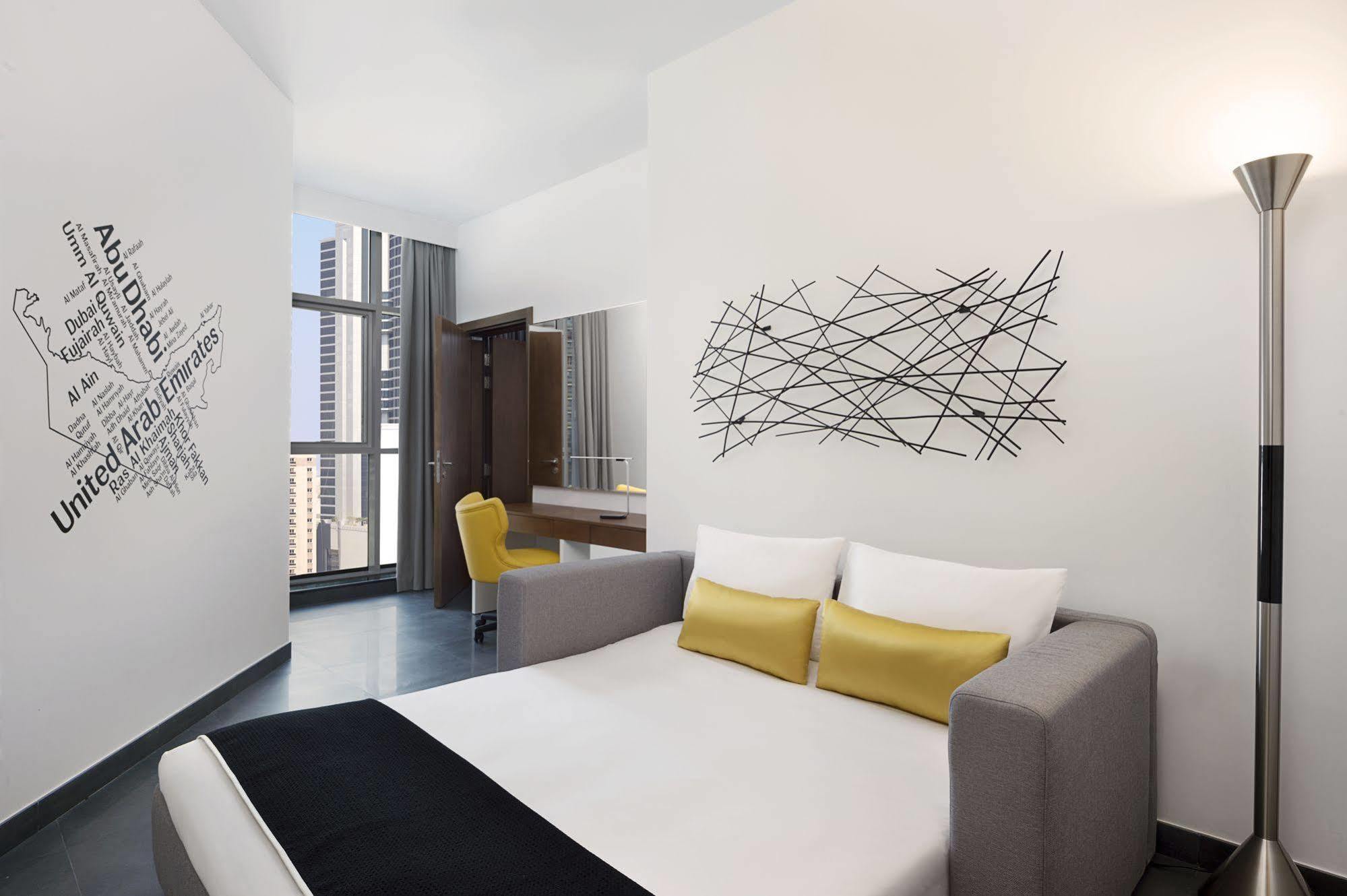 Hotel Tryp By Wyndham Dubai Esterno foto The map of the United Arab Emirates on the wall of the room