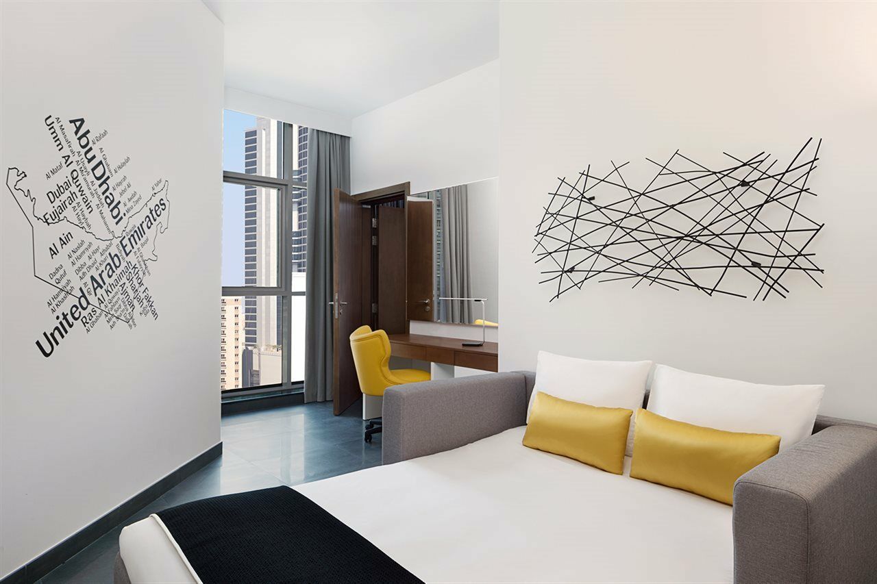Hotel Tryp By Wyndham Dubai Esterno foto The map of the United Arab Emirates on the wall of a room at the hotel